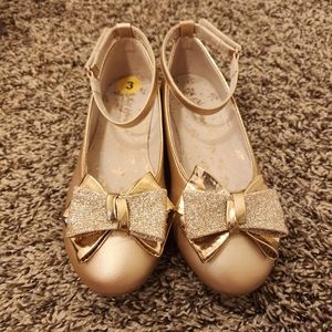 Gold girl flats